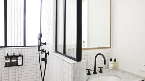 Suite | Bathroom | Shower, rainfall showerhead, designer toiletries, hair dryer