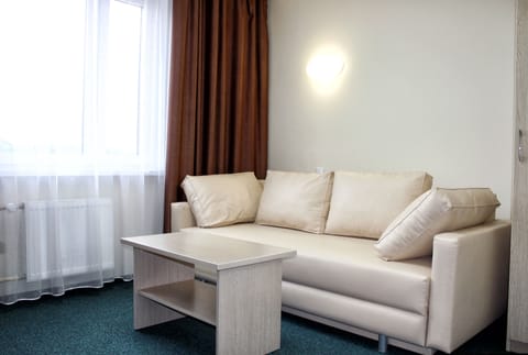 Deluxe Room, 1 Bedroom | Living room | LCD TV