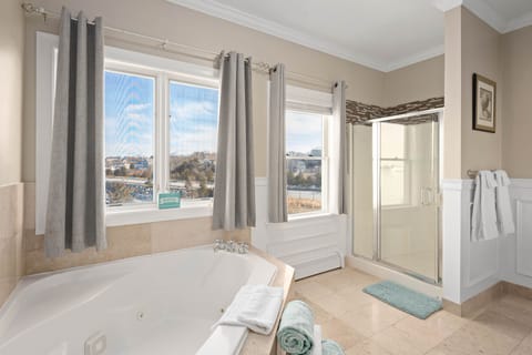 Superior Suite w/ Hot Tub and Fireplace | Bathroom | Designer toiletries, hair dryer, towels, soap