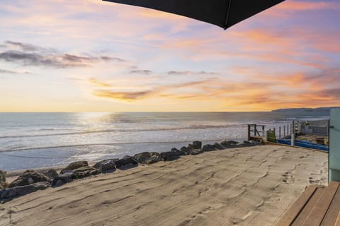 Golden sunset over the shoreline, perfect for evening strolls or quiet moments
