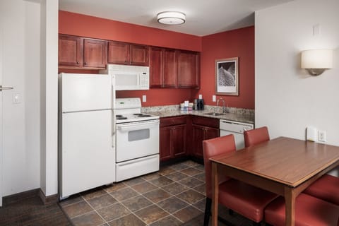 Suite, 2 Bedrooms | Private kitchen | Fridge, microwave, stovetop, dishwasher