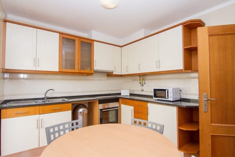 Family Apartment, 1 Bedroom, Non Smoking, Balcony | Private kitchen | Fridge, microwave, oven, stovetop