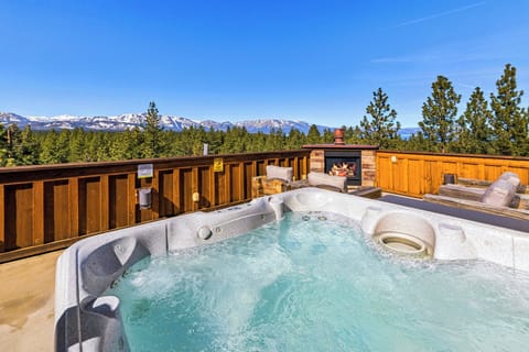 Soak in bubbling hot tub waters while taking in breathtaking mountain vistas and forest views from your private deck retreat.