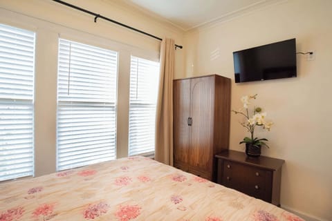 Bedroom 2 with queen bed and Smart TV