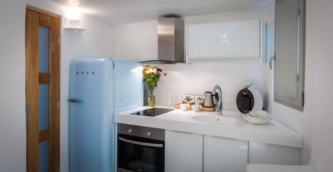 Grand Suite, 3 Bedrooms, Private Pool, Sea View (Caldera View) | Private kitchen | Full-size fridge, espresso maker, coffee/tea maker, electric kettle