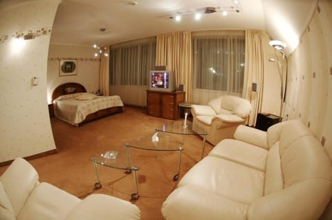 Deluxe Studio, Sea View | Living room | Flat-screen TV