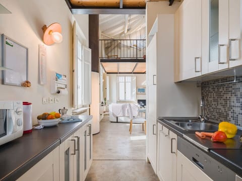 Kitchen, Interior Design, Countertop, Kitchen Appliance, Major Appliance, Ceiling, Flooring, Furniture, Floor, Home Appliance