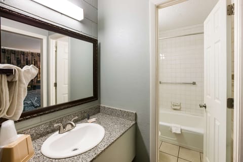 Room, 1 Queen Bed, Smoking | Bathroom | Free toiletries, hair dryer, towels