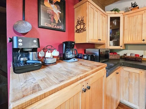 Coffee Station with Espresso Maker, Drip Coffee Maker, French Press, Grinder and Fresh Coffee Beans.  Teas and Cocoa also available.