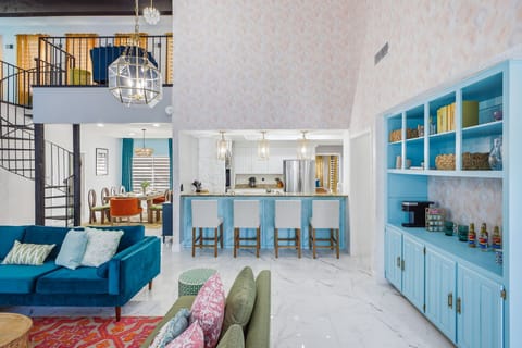 Flow effortlessly from the living room to the dining area and kitchen—this open layout is designed for connection, laughter, and endless fun.