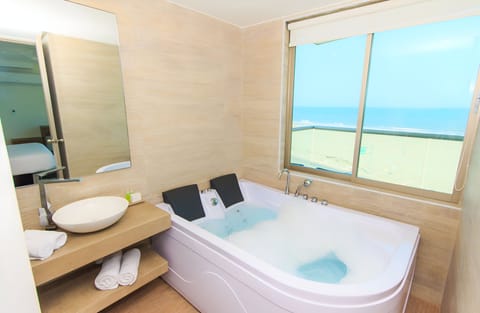 Romantic Suite, 1 Double Bed, Ocean View | Bathroom | Shower, rainfall showerhead, free toiletries, towels