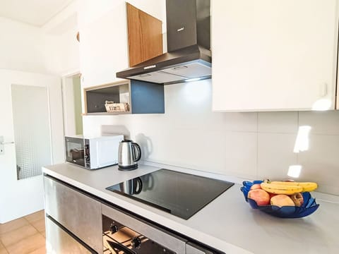 Wood, Furniture, Flooring, Interior Design, Floor, Ceiling, Apartment, Room, Wood Stain, Chair