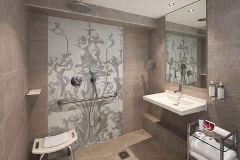 Superior Garden Room | Bathroom | Designer toiletries, hair dryer, slippers, towels