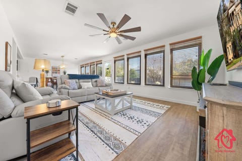 Stylish living room with modern furnishings and natural light.
