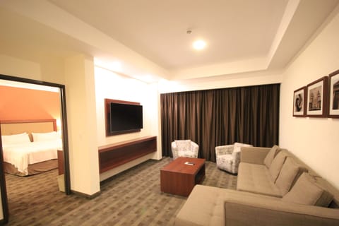 Suite, 1 Bedroom | In-room safe, desk, laptop workspace, iron/ironing board