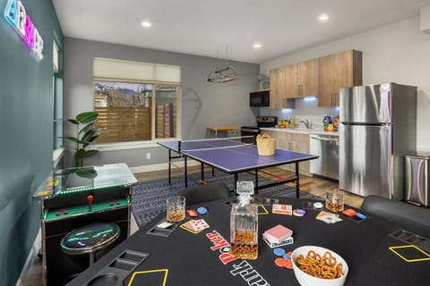 The ultimate game room—poker, ping pong, and arcade fun all in one place!