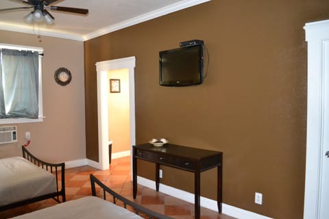 Family Studio, 2 Queen Beds, Kitchenette | Living area | 32-inch flat-screen TV with cable channels, TV, streaming services