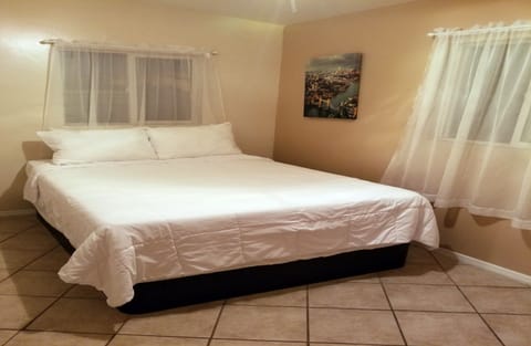 Deluxe Room, Multiple Beds | Desk, iron/ironing board, free WiFi, bed sheets