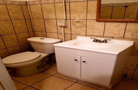 Deluxe Room, Multiple Beds | Bathroom | Shower, designer toiletries, towels, soap