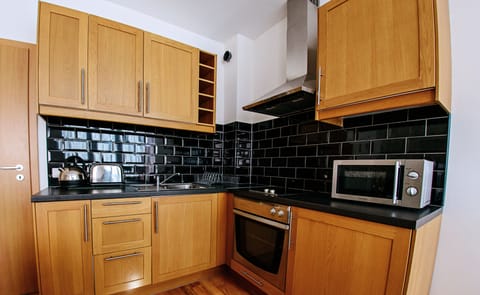 Luxury Apartment, 2 Bedrooms, Kitchen ( Free Sauna and Jacuzzi) | Private kitchenette | Fridge, microwave, oven, stovetop