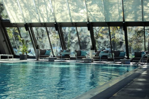 Indoor pool, open 6:30 AM to 10 PM, pool umbrellas, sun loungers