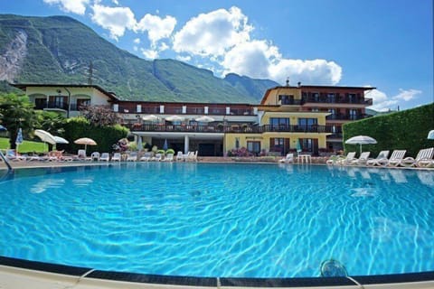 Seasonal outdoor pool, pool umbrellas, sun loungers