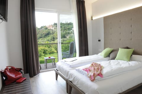 Junior Suite, Balcony | In-room safe, desk, soundproofing, cribs/infant beds