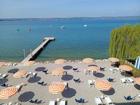 Private beach, sun loungers, beach umbrellas, beach towels
