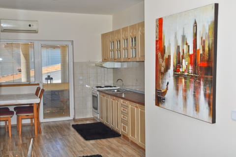 Comfort Apartment, 2 Bedrooms, Balcony | Private kitchen | Full-size fridge, oven, stovetop, coffee/tea maker