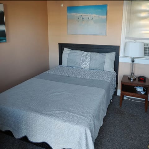 Room, 1 Queen Bed | Individually decorated, blackout drapes, free WiFi, bed sheets
