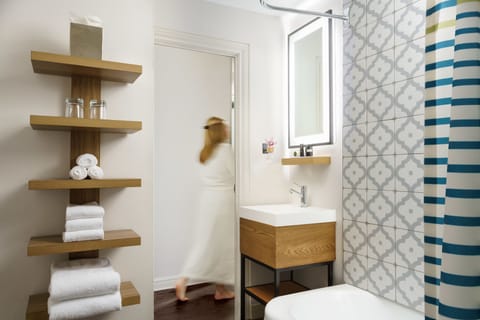 Combined shower/tub, eco-friendly toiletries, hair dryer, towels