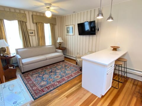 Traditional Apartment (Pet Friendly) | Living area | 45-inch plasma TV with cable channels, TV