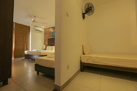 Deluxe Quadruple Room, Non Smoking, Canal View | Egyptian cotton sheets, premium bedding, memory foam beds, minibar