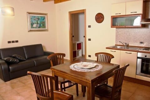 Family Apartment | Living area | 22-inch LCD TV with satellite channels, TV