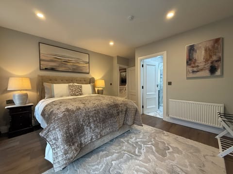 King bedroom en-suite with large power shower