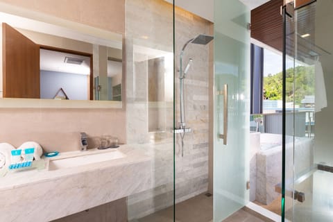 Separate tub and shower, deep soaking tub, eco-friendly toiletries