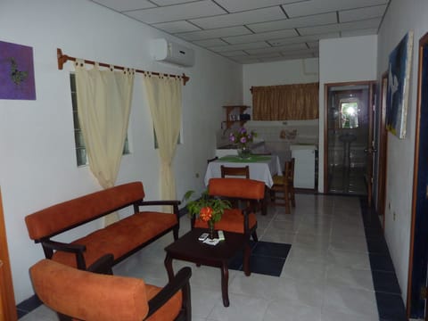 Standard House, 2 Bedrooms | Living area | Flat-screen TV