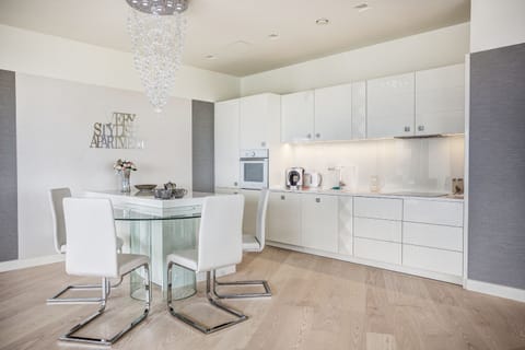 Exclusive Penthouse | Private kitchen | Full-size fridge, microwave, oven, stovetop