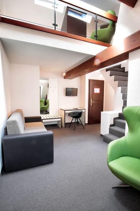 Junior Suite, Multiple Beds | Living area | 40-inch flat-screen TV with cable channels, TV