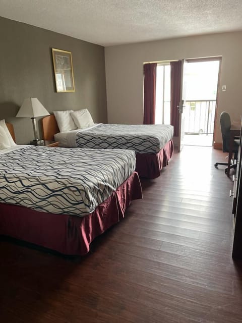 Deluxe Room, 2 Double Beds | Desk, laptop workspace, free WiFi, bed sheets