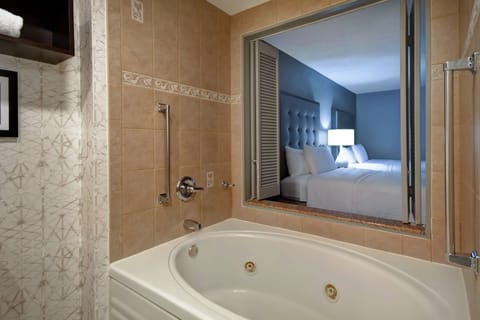 Suite, 1 Bedroom, Jetted Tub | Bathroom | Designer toiletries, hair dryer, towels