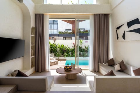 Deluxe Villa, 2 Bedrooms, Balcony, Pool View | Living area | 32-inch Smart TV with digital channels