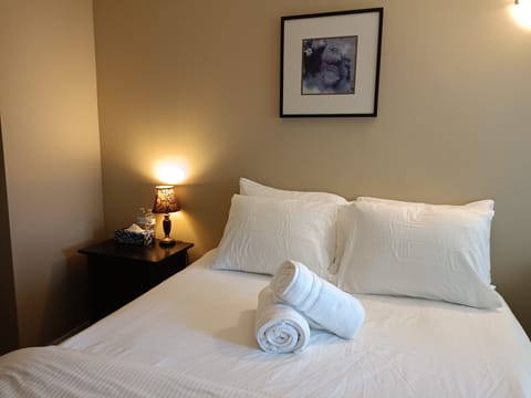 Classic Room, 1 Queen Bed, Shared Bath, Shared Living Space | Premium bedding, free WiFi