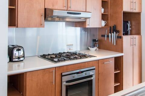 Apartment, 5 Bedrooms | Private kitchen | Full-size fridge, microwave, stovetop, dishwasher