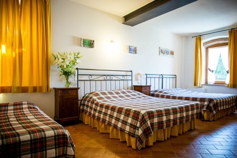 Quadruple Room | In-room safe, individually decorated, individually furnished, desk