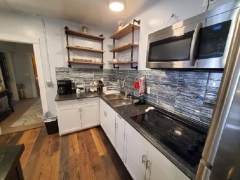 Standard Studio Suite | Private kitchen | Full-size fridge, microwave, stovetop, dishwasher