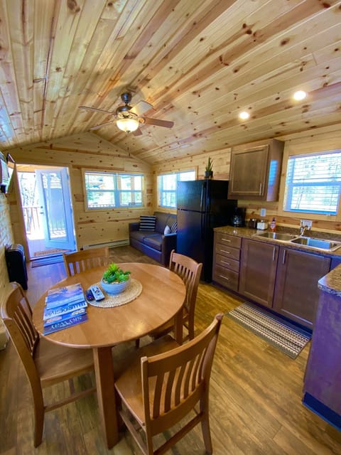 Deluxe Cabin, River View | Living area | LED TV, streaming services