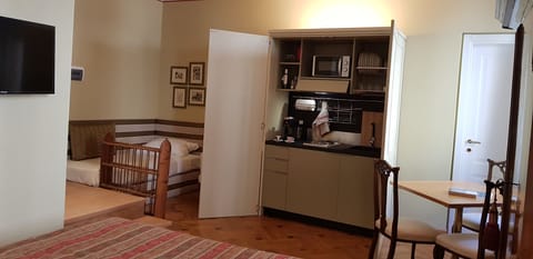 Comfort Triple Room, 1 Bedroom, Kitchenette | Private kitchenette | Fridge, microwave, espresso maker, coffee/tea maker