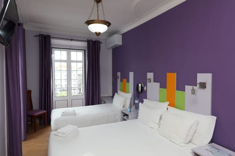 Standard Triple Room, Shared Bathroom | In-room safe, soundproofing, iron/ironing board, free WiFi