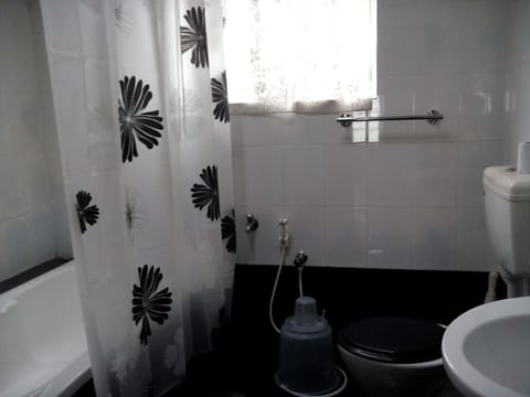 AC Double Room | Bathroom | Shower, free toiletries, towels